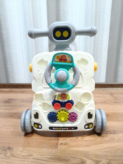 Музичні ходунки толокар каталка гойдалка, столик розвиваючий