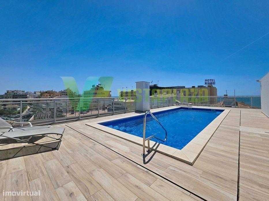 Apartamento T3 na Praia da Rocha com Piscina Panorâmica e Estaciona...