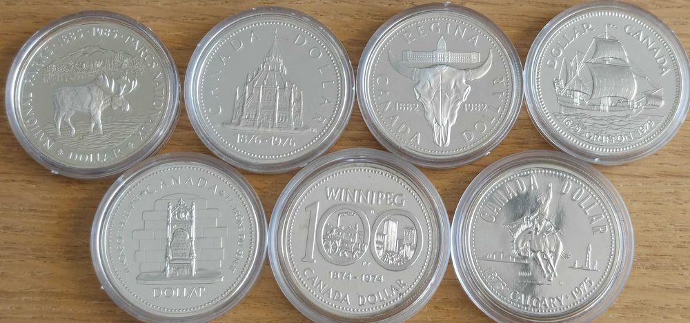 Kanada - 7 monet o nominale 1 dolar. Z certyfikatami.