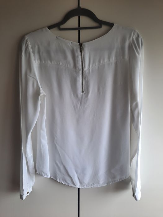 Blusa branca com detalhe no peito da Tiffosi