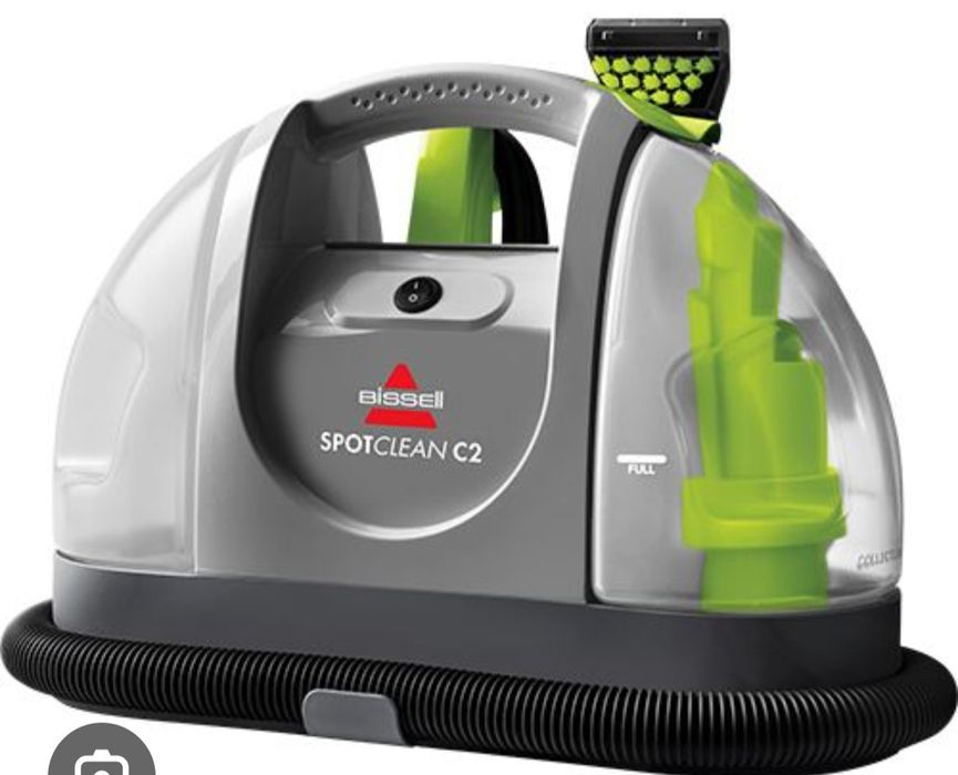 o aspirador de carpetes e estofos