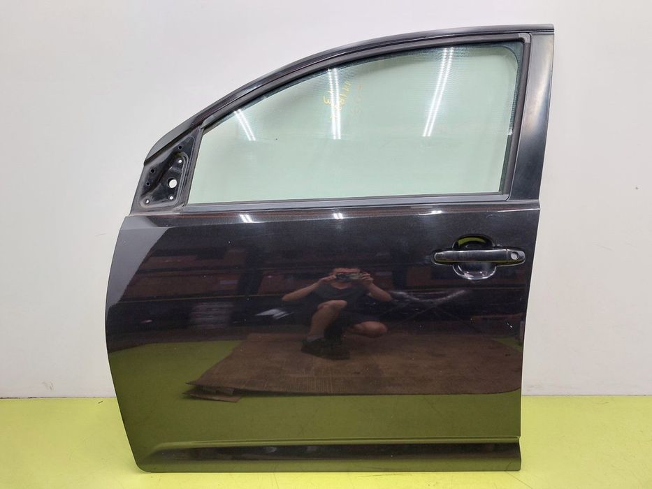 Drzwi przednie lewe przód Daihatsu Sirion II M300 04-10 CZARNY BEZ KOROZJI