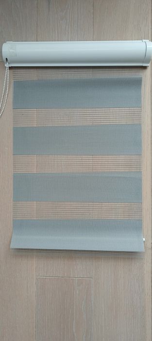 Roletka wewnętrzna dzień/noc + listwy boczne.