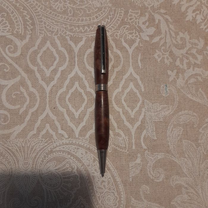 Caneta em Cerâmica.