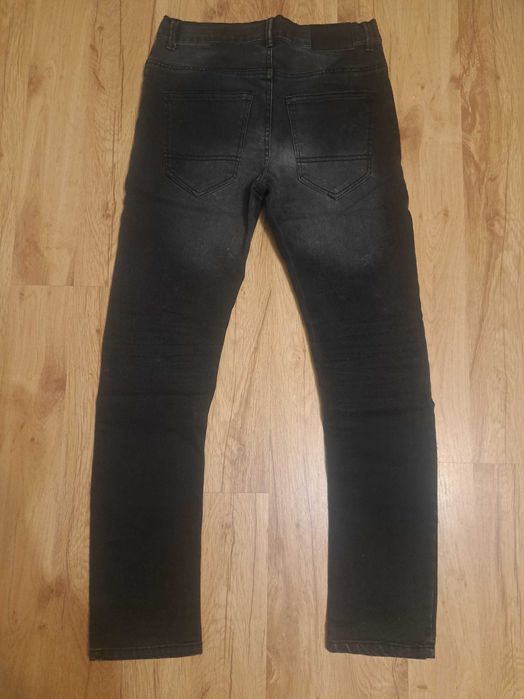 Sprzedam jeansy dla chłopca używane r.152