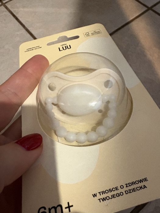 Smoczek Luu swiecacy w ckemnosci 6m+