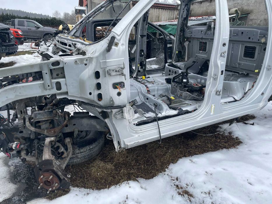 Ram 1500 IV DS po 13r. Poszycie bok progi ćwiartka dach słupek QuadCab