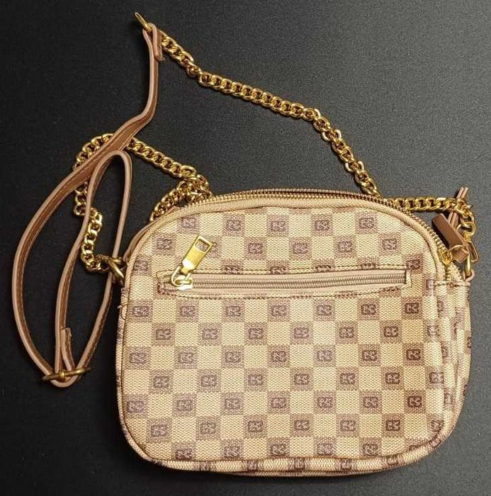 Bolsa tira colo dourada em ótimo estado