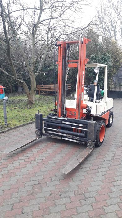 NISSAN wozek widlowy blizniaki pozycjoner scisk toyota podwojne kola