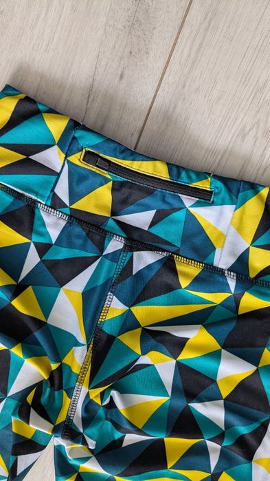 Wielokolorowe leginsy z kieszonką na zamek Crivit S 36