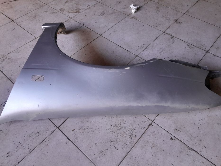 Guarda lamas esq nissan almera n15