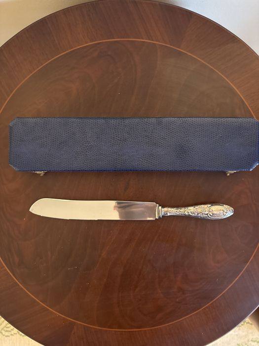 Faca com cabo de prata