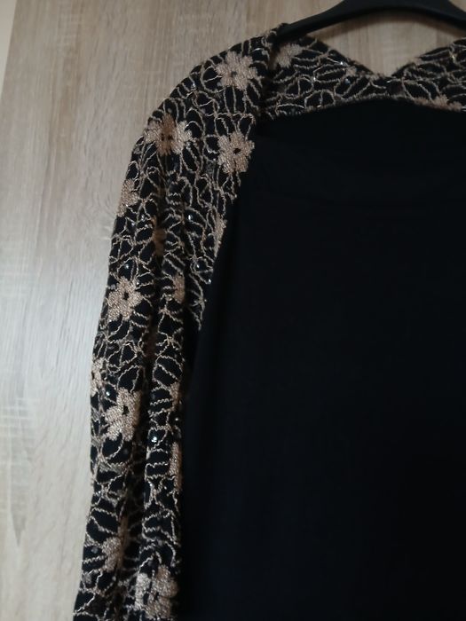 Czarna sukienka wizytowa  rozmiaru M/L .