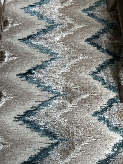 Tapete para sala com tons em azul