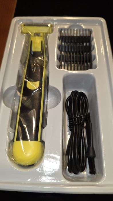 Máquina de barbear e cortar pelos ou cabelo