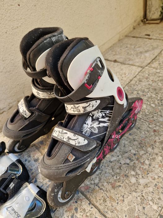 Patins menina e proteção
