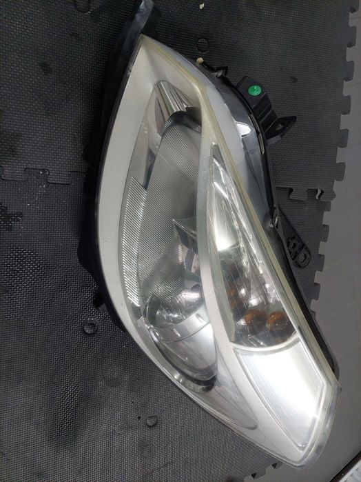 farol esq Renault Clio