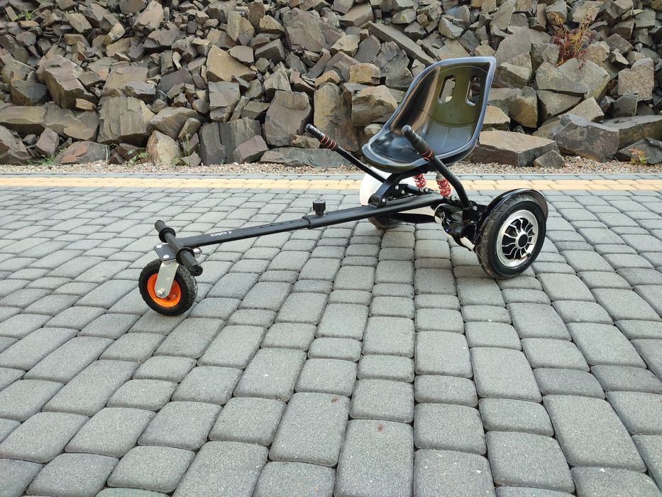 Hoverboard plus przystawka jeździk.