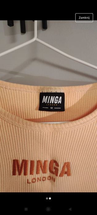 Pomarańczowy top z falbankami Minga London