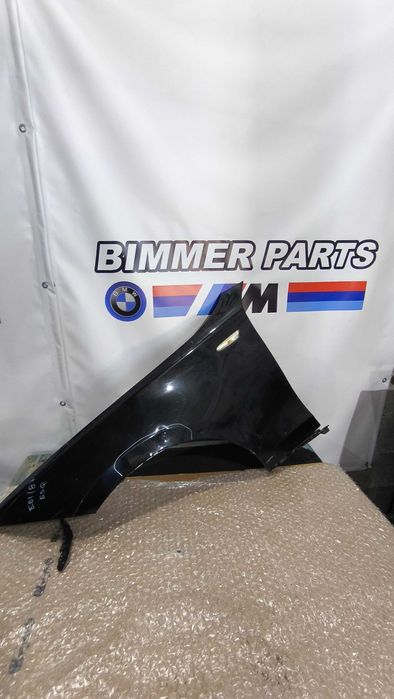 Guarda Lamas BMW (E81/E82/E87/E88) Esquerdo (Com defeito)