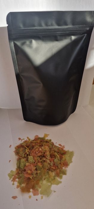 Comida em flocos para peixes
