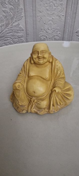 Статуетка Будди .