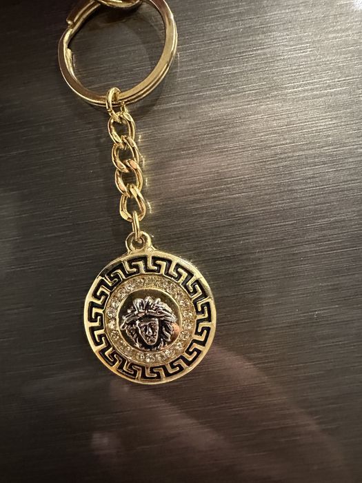 brelok z głową versace