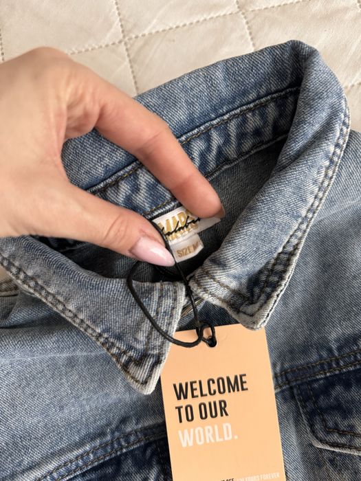 Джинсовий комбінезон із кишенями