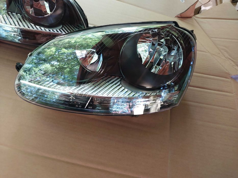 VW GOLF V reflektory lampy nowe CZARNE komplet