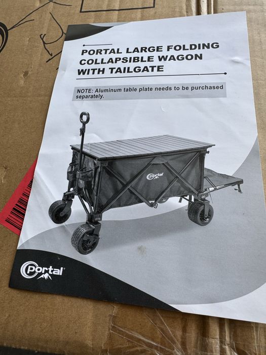 wózek składany marki Portal z funkcją tailgate (otwieraną tylną klapą).