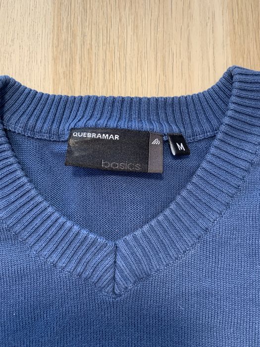 Homem camisola de malha da quebramar