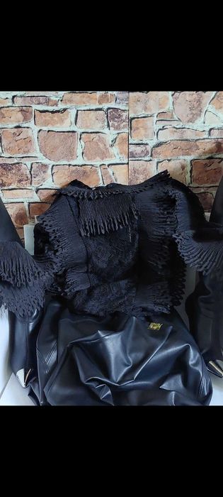 Przepiękne koronkowe czarne body  o wyjątkowym design