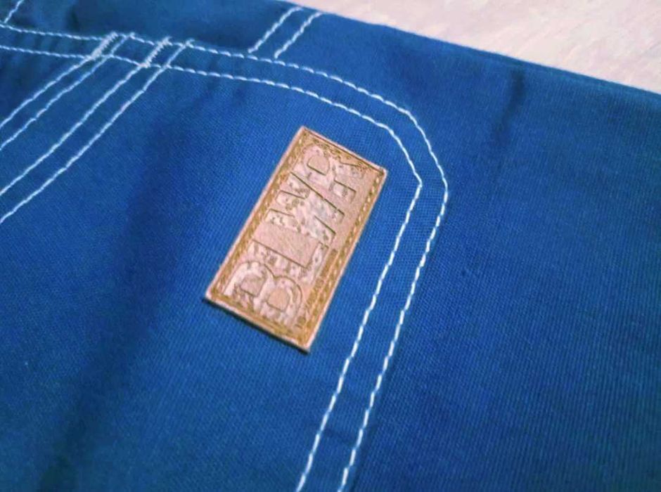 Spodnie ogrodniczki z ochroniaczami na szelkach 98/104