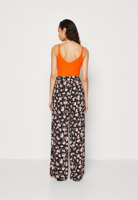 Spodnie na gumce  w kwiaty, szeroka nogawka, Anna Field XL