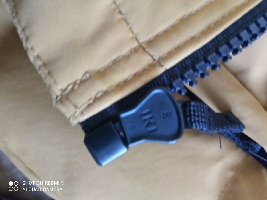 Продам пуховик Colins