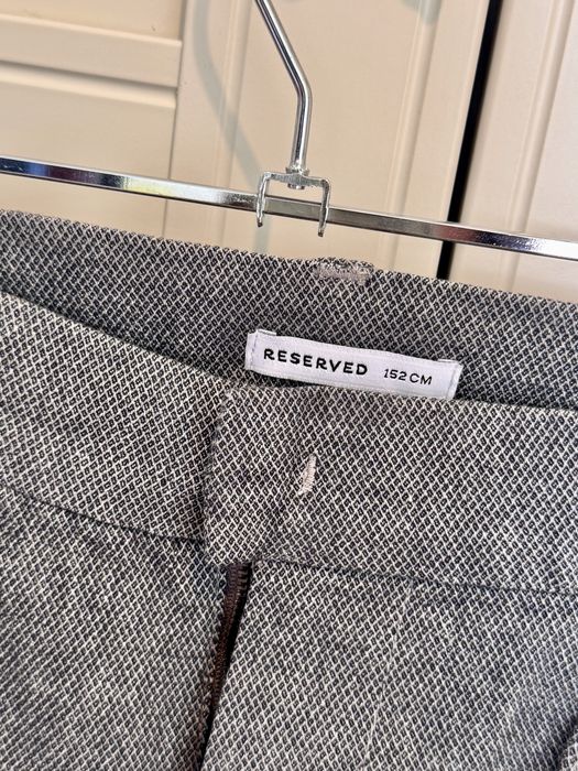 Chlopięce spodnie eleganckie Reserved