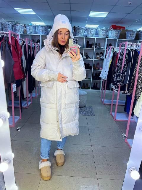 Пуховик в молочному кольорі