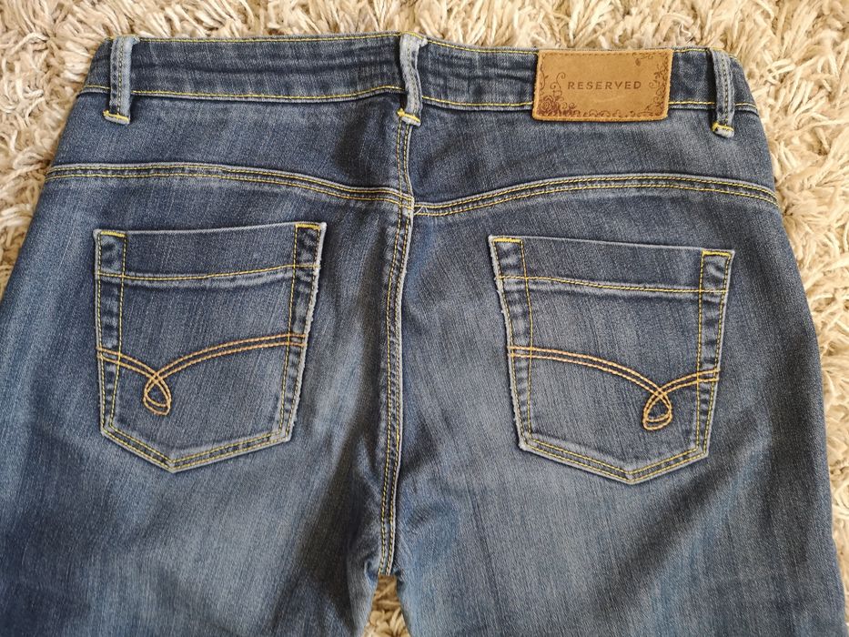 Damskie jeansy: RESERVED - rozm.38