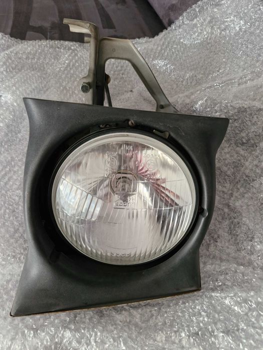 Farol lado Direito com motor MX5 Na