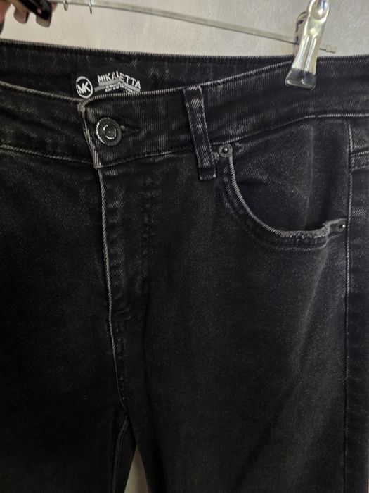 Жіночі джинси мом