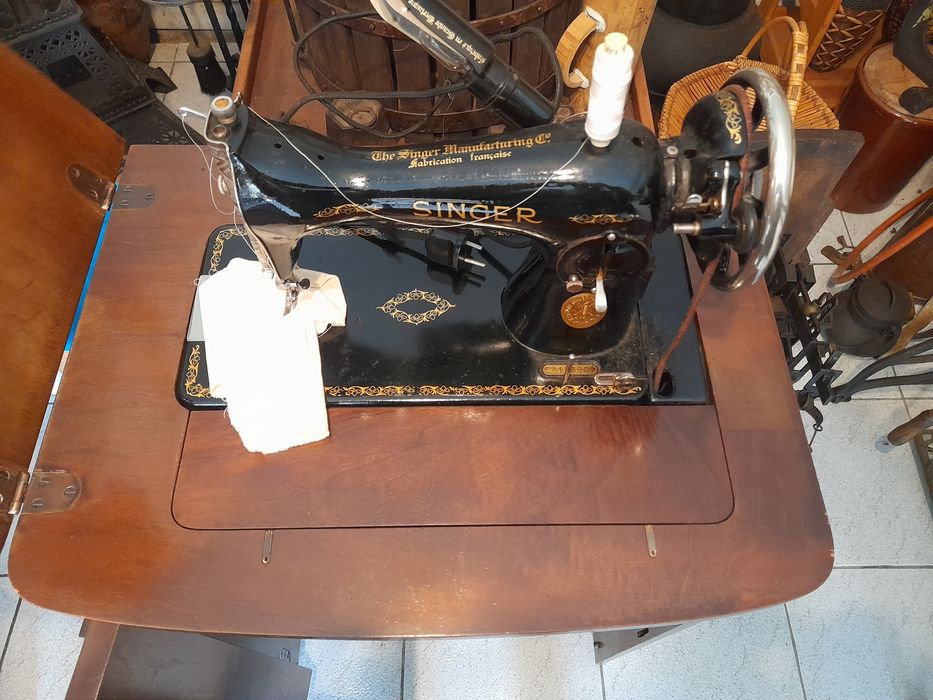 Máquina de costura singer