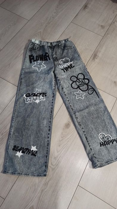 Spodnie jeansy 40 zł para 152