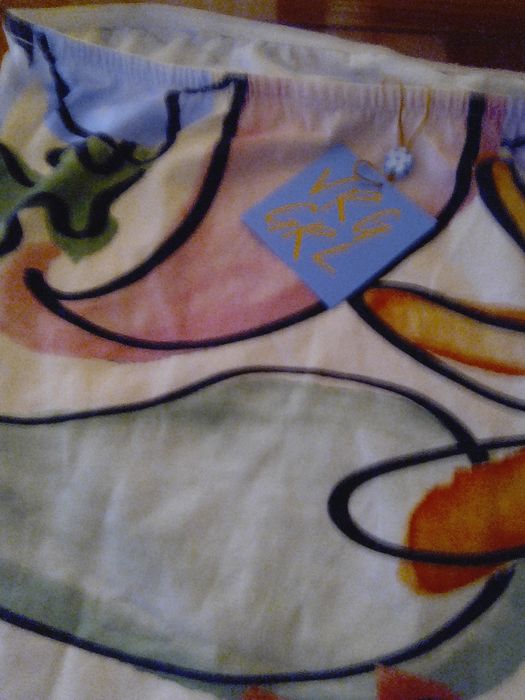 Vestido curto em cai-cai