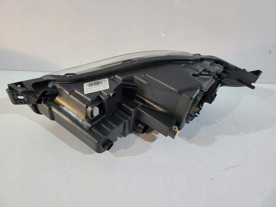 Jaguar XJ lampa przednia bi-xenon R 13440