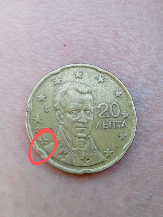 Moedas de 20 cêntimos gregas 2002, com defeitos e letra "E"