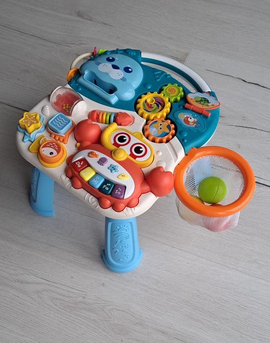 Pchacz i stolik edukacyjny 2w1