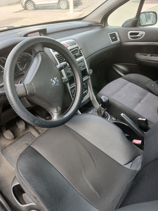 Peugeot 307 de 7 lugares 2004 gasolina super económico ac carregado