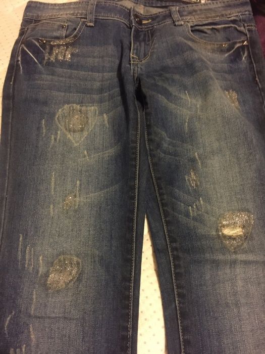 Spodnie jeansy W28