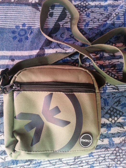 Mala tira colo homem