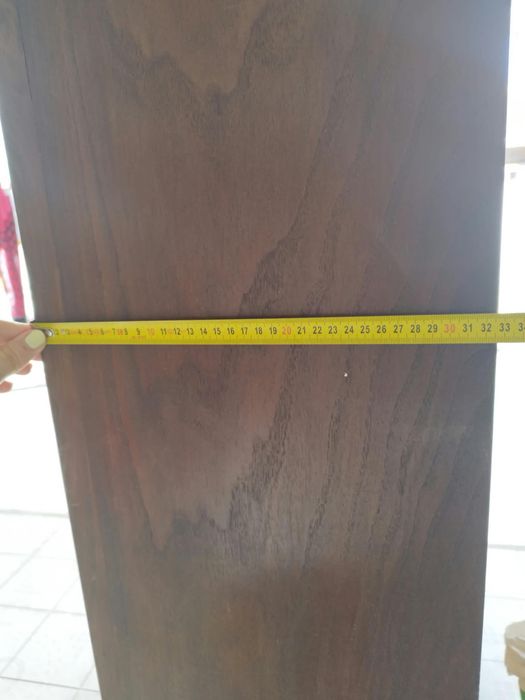 Armário trabalhado com patas de leão